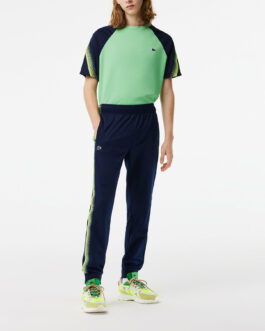 LACOSTE – Pantalon jogging – bleu marine et vert fluo