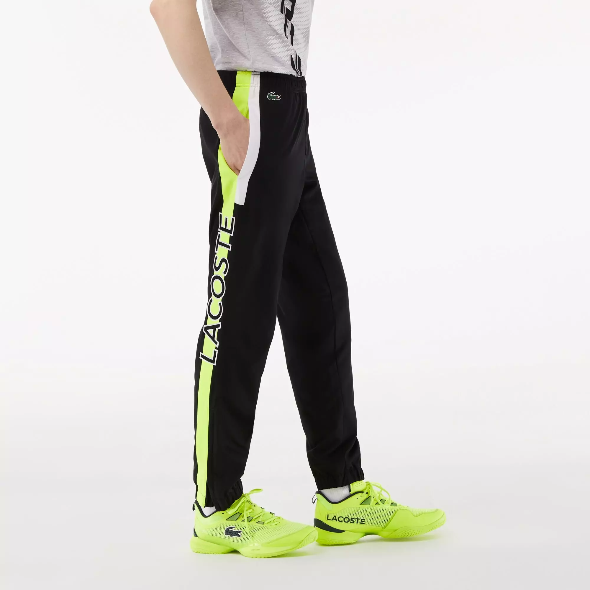 LACOSTE – Pantalon jogging – noir et vert fluo